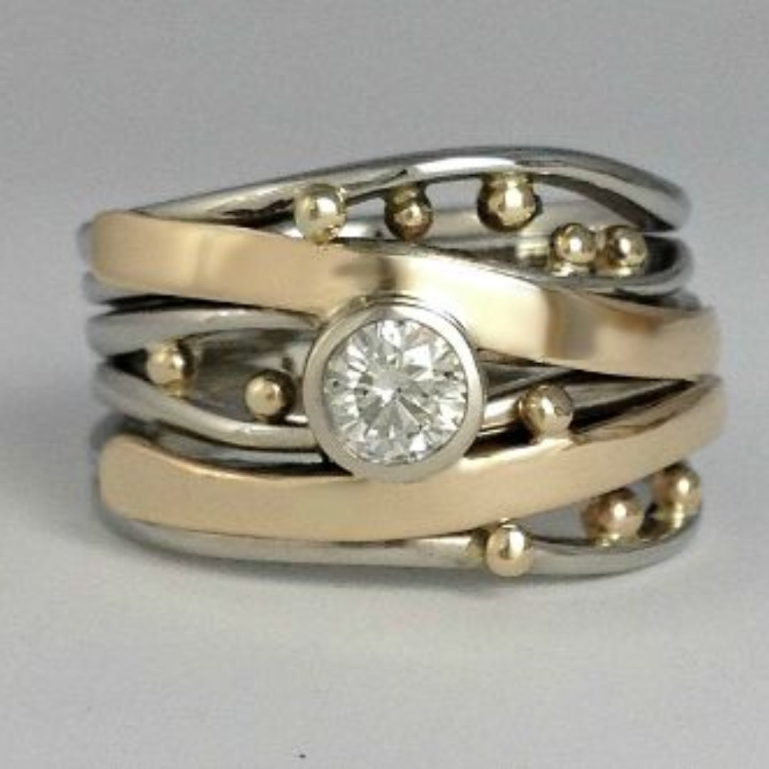 Vintage gold ring with intarsia and zirconia