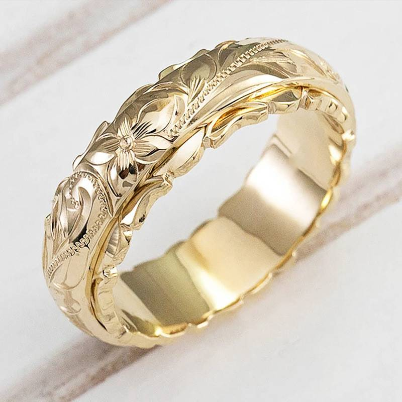 Vintage gold ring with a flower